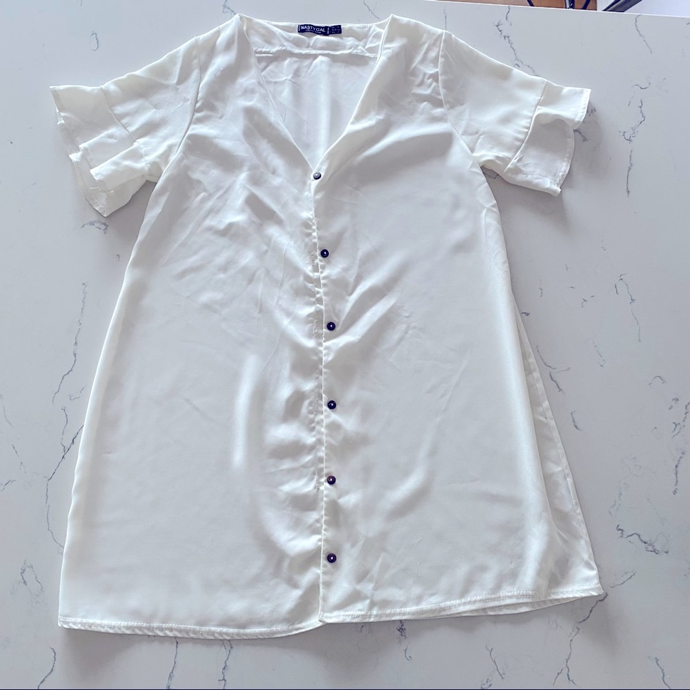 White dress or long top (depending on height or event)